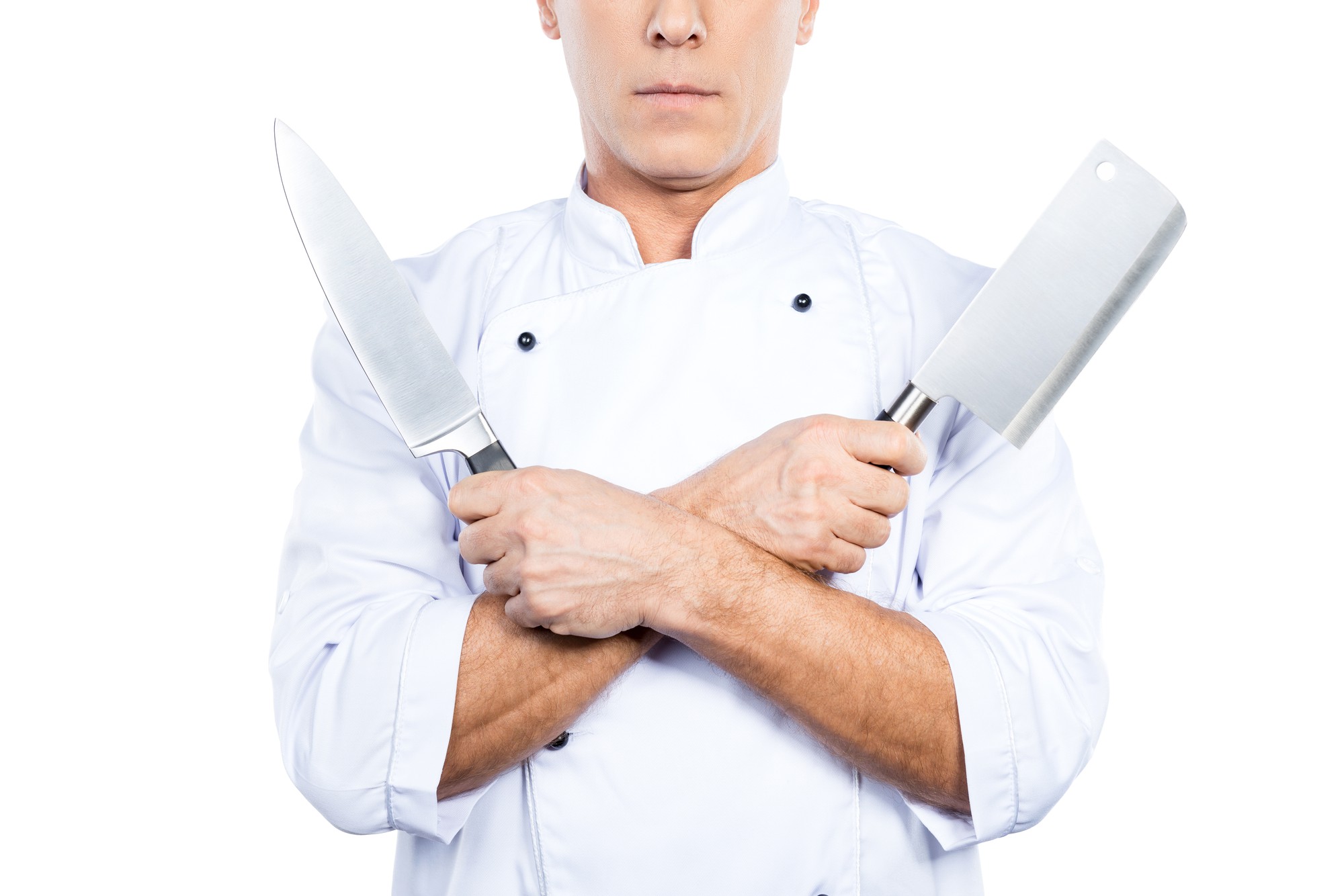 Chef che mostra una tecnica di taglio rapida